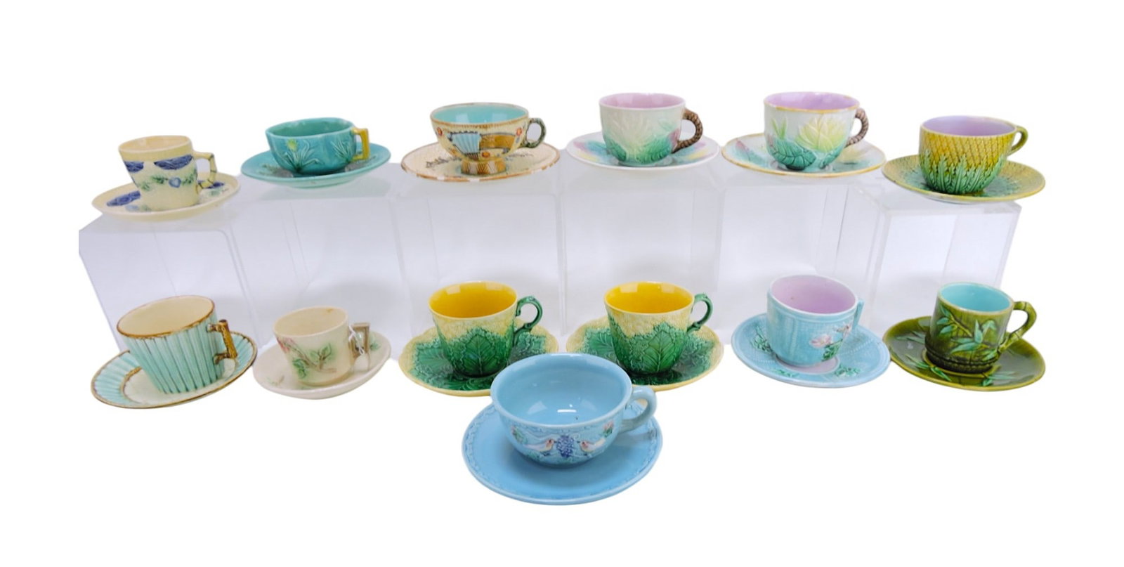 Majolica lot of 13 cups & saucers,: various condition