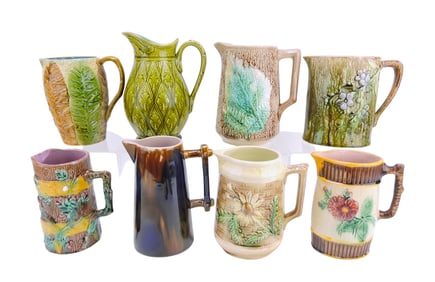 Majolica lot of 8 pitchers,