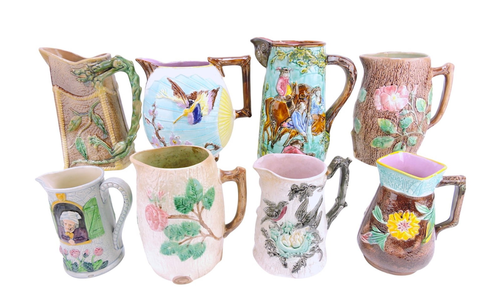 Majolica lot of 8 pitchers,: 7 1/2" to 10", various condition