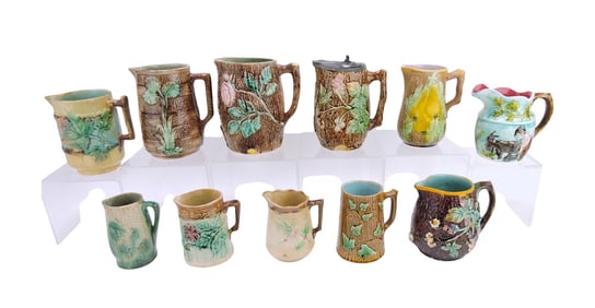 Majolica lot of 11 pitchers,