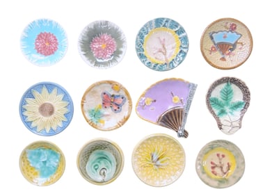 Lot of 12 majolica butter pats, 3",