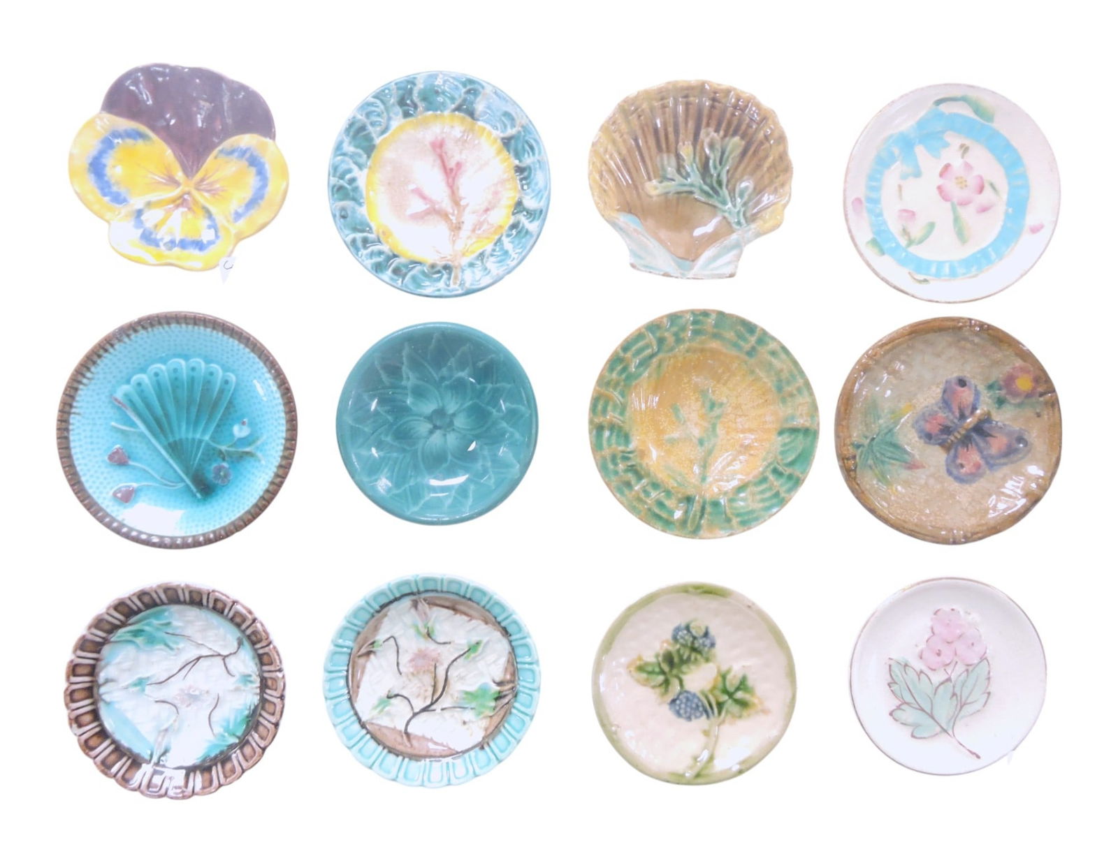 Lot of 12 majolica butter pats, 3",: Copeland, Wedgwood, and more
