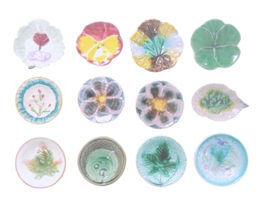 Lot of 12 majolica butter pats, 3",