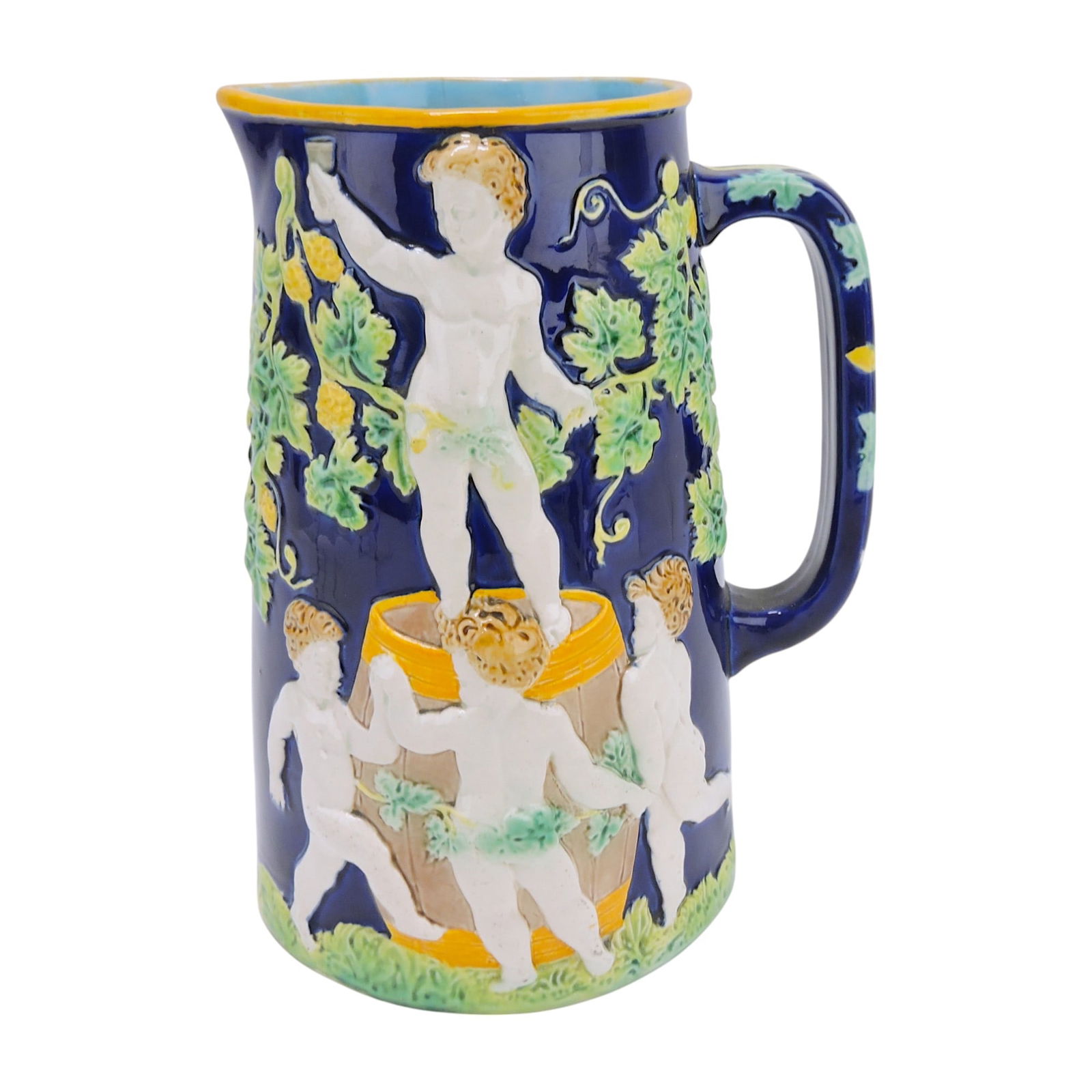 George Jones majolica rare cobalt: wine jug with putti surrounding wine barrel, 9", hairline