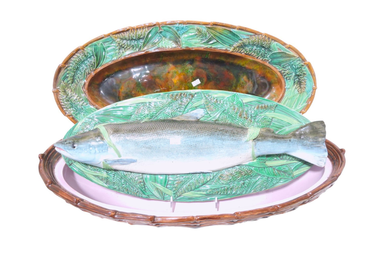 George Jones majolica salmon tureen: with rare matching undertray, a 24" basketweave tureen base with large salmon on bed of ferns and leaves on cover all atop an extremely rare leaf and fern tray (26"l, 13"w), professional rim repair to