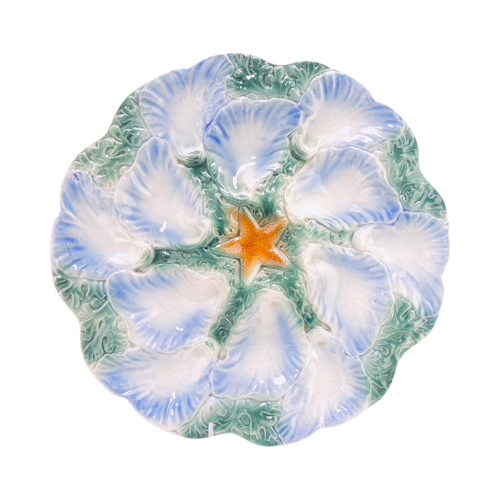 French majolica 12 well oyster: serving tray with starfish in center, 13 1/2"