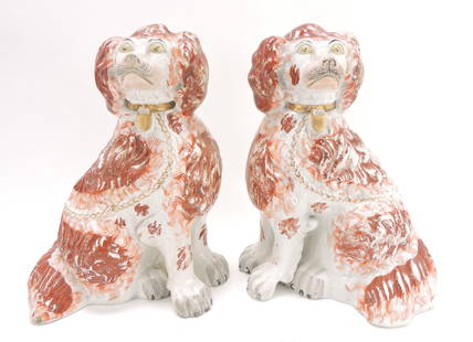 Staffordshire pair of large russet: spaniels with free leg, 12 1/2", chip to base rim of one
