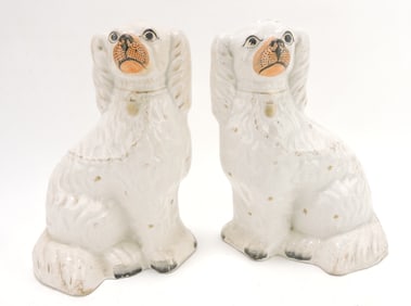 Staffordshire pair of white spaniels,