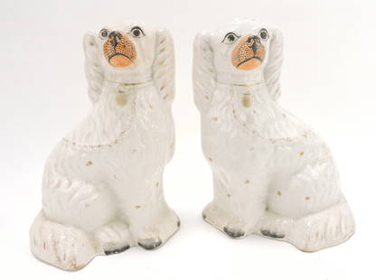 Staffordshire pair of white spaniels,: 10", repair to one