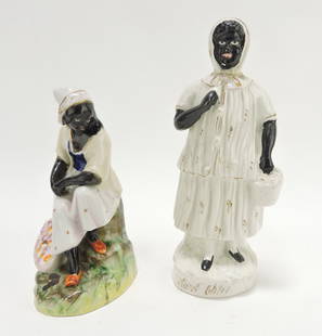 Staffordshire lot of 2 rare Aunt Chloe figures,: Uncle Tom’s Cabin characters, 6 ½” and 8 ½”, C. 1852. Repair to neck of standing figure.