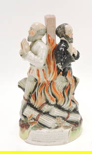 Rare Staffordshire figure of Bishops Ridley and: Latimer, burning at the stake, titled “Ridley and Latimer” with inscription below title, C. 1851. Some paint loss.
