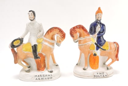 Two titled Staffordshire figures of Marshal Arnaud