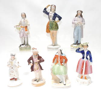 Six Staffordshire figures to include Jenny Lind,: Ali Baba, Morgiana, a dancing figure probably of Jules Perrot as Albrecht, a very rare Lord Dundreary figure, and a flower seller. Also included in this lot is a pirate figure inkwell/penholder,