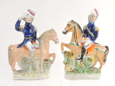 Pair of Staffordshire military horsemen figures