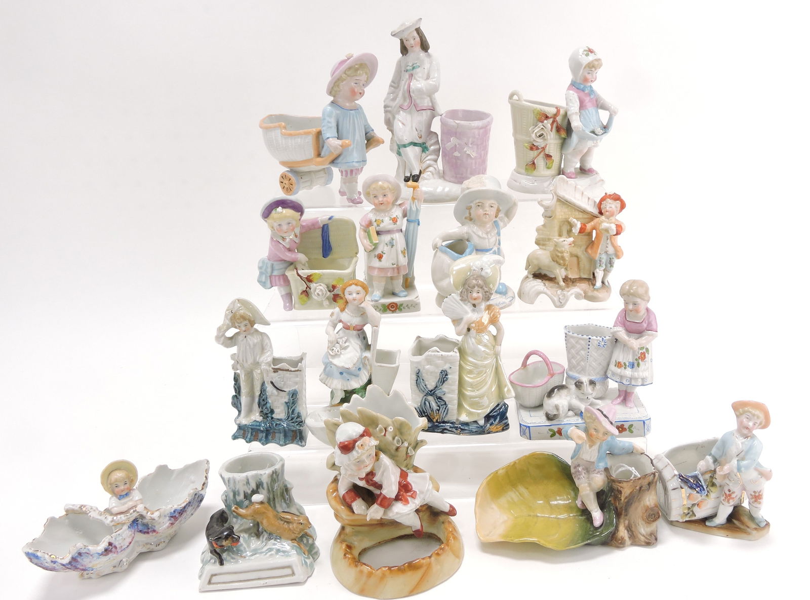Staffordshire porcelain lot of: 16 figural toothpick holders and match holders, various condition, 3" to 6"