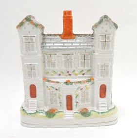 Staffordshire townhouse figure,