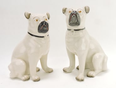Staffordshire pair of pug dogs,