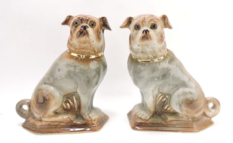 Staffordshire pair of pug dogs,
