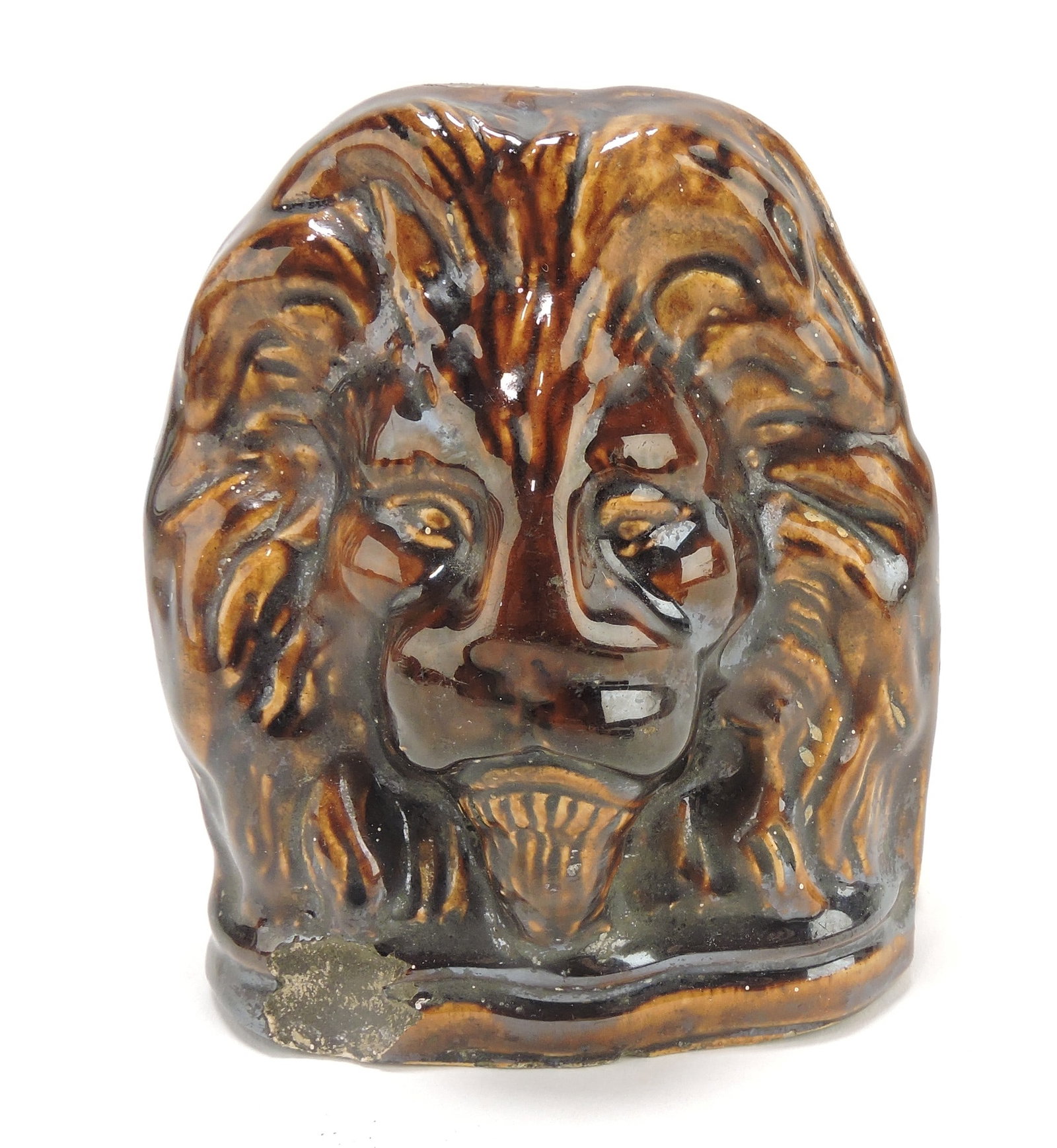 Bennington Rockingham lion window: sash stop, chip to base rim, 5 1/2"