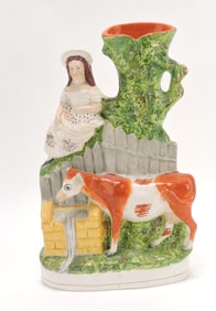 Staffordshire spill vase with girl and