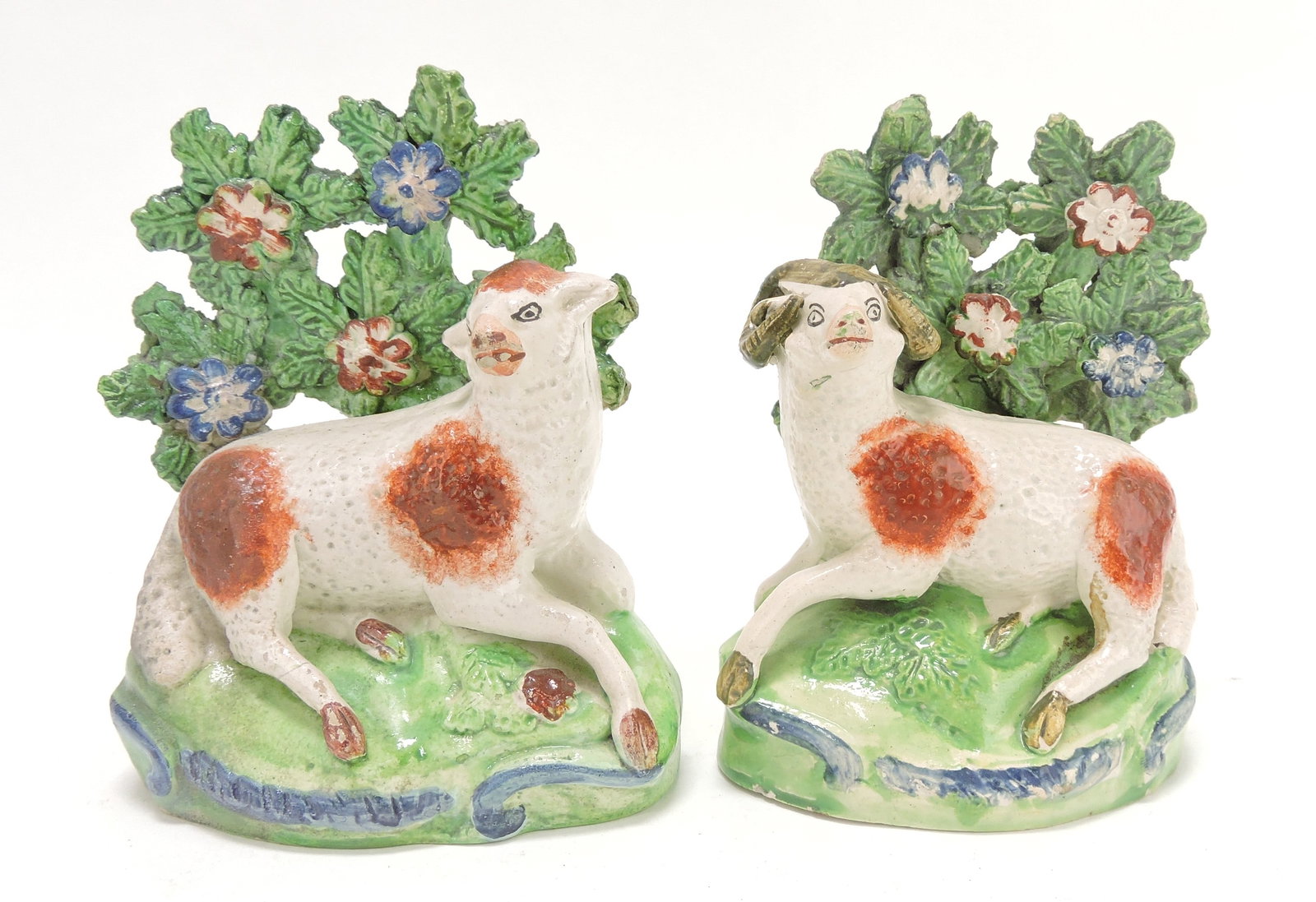 Staffordshire Pearlware pair of sheep: with bocage, 5", various condition