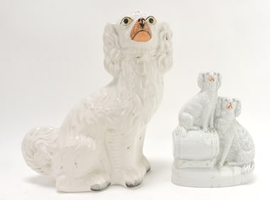 Staffordshire lot of 2 spaniel figures,