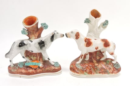 Staffordshire lot of 2 dog spill vases,