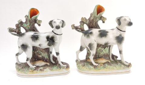 Staffordshire lot of 2 dog spill vases,