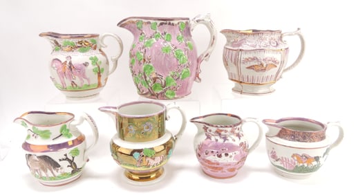 Pink lustre lot of 7 pitchers,