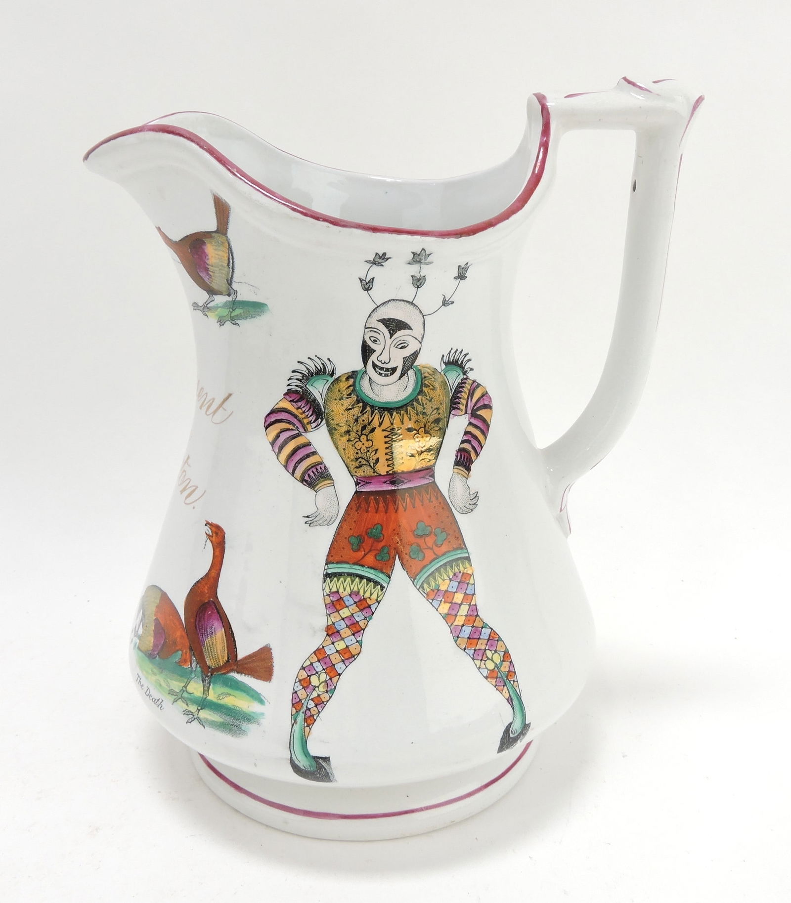 Elsmore & Forster 'Clown' puzzle jug,: 9", hairline