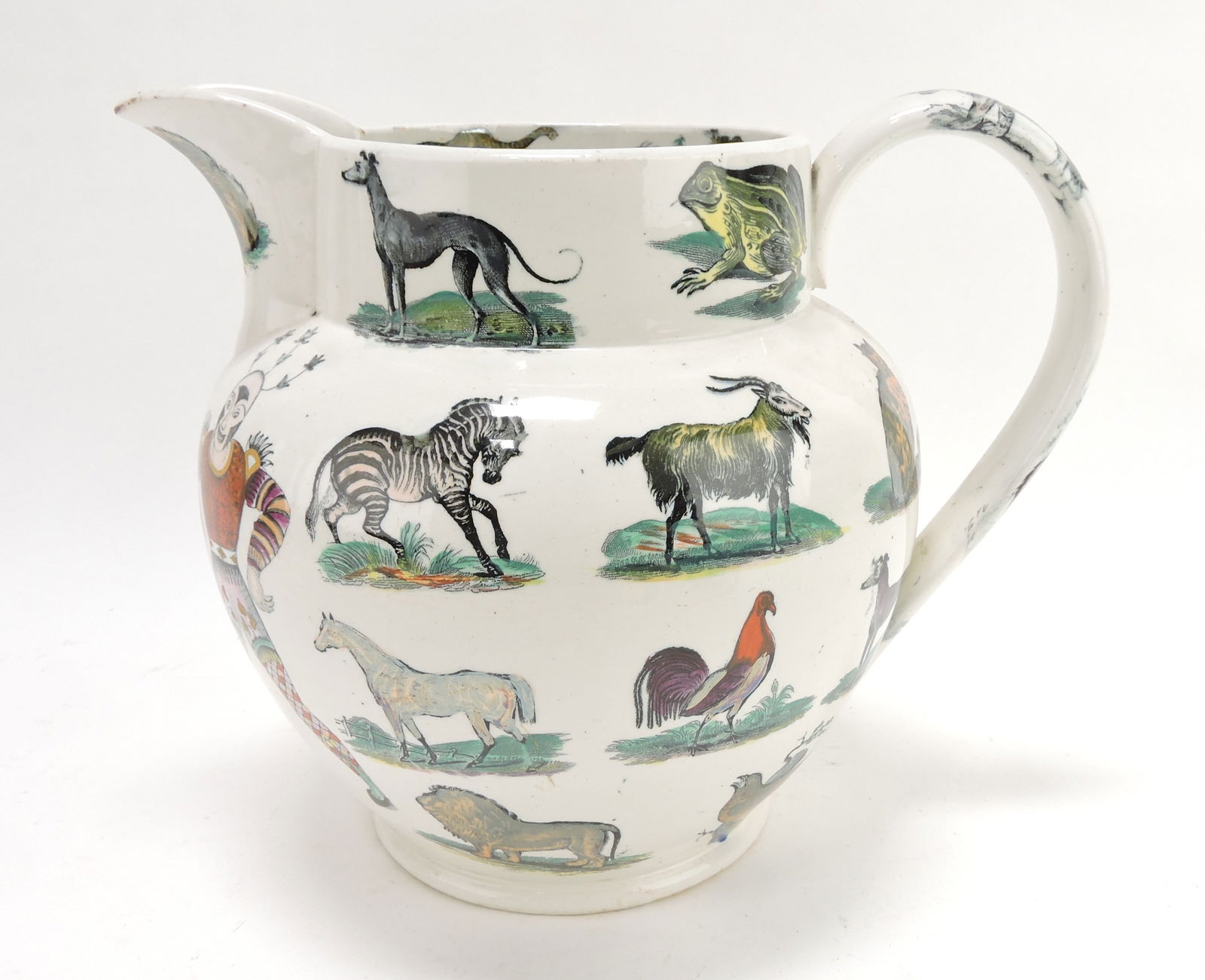 Elsmore & Forster 'Clown' jug with: transfer decorated with clowns and assorted animals, 9 1/2"