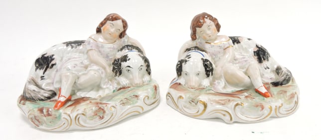 Staffordshire pair of figures of girl with