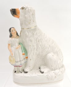 Staffordshire girl with large dog,