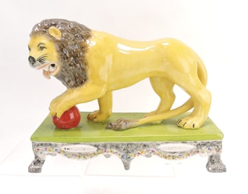 Contemporary Staffordshire lion figure,