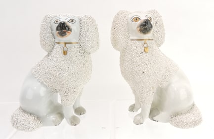 Staffordshire pair of free leg poodles,