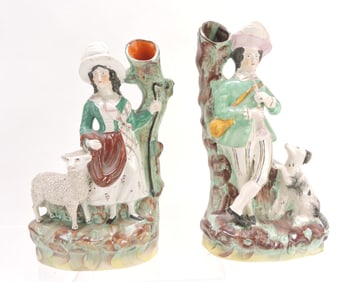 Staffordshire pair of figural spill vases,