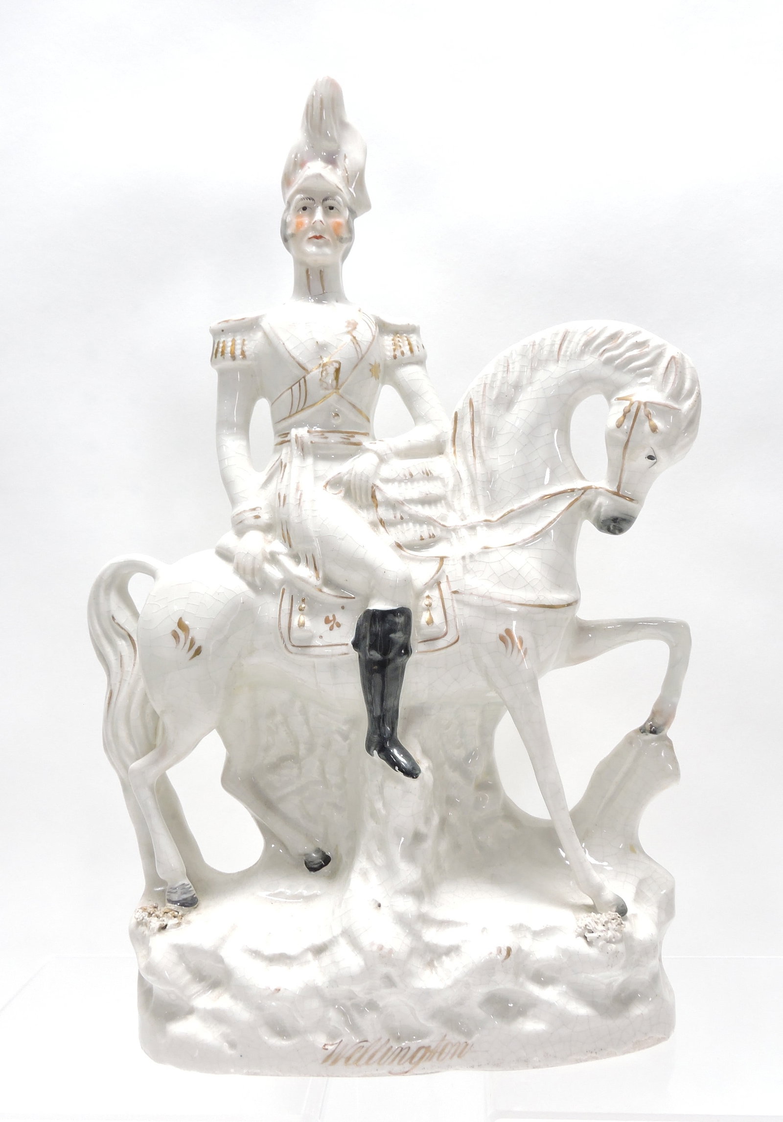Very Rare, gilt-script titled Staffordshire figure of: the Duke of Wellington on horse, 16”, Wellington’s head re-stuck.