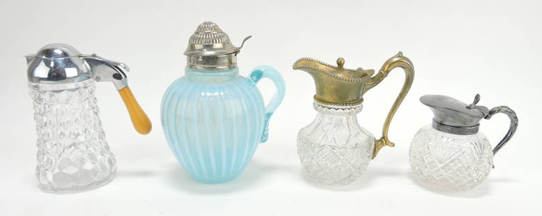 Lot of 4 syrup pitchers: American Fostoria,: blue opalescent striped, Mt. Washington cut glass, and cut glass, 3 1/2" to 6"