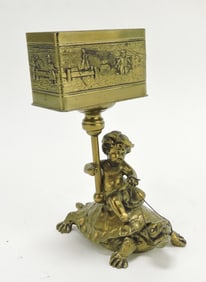 Pairpoint gold wash figural card/