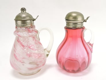 Lot of 2 syrup pitchers - cranberry