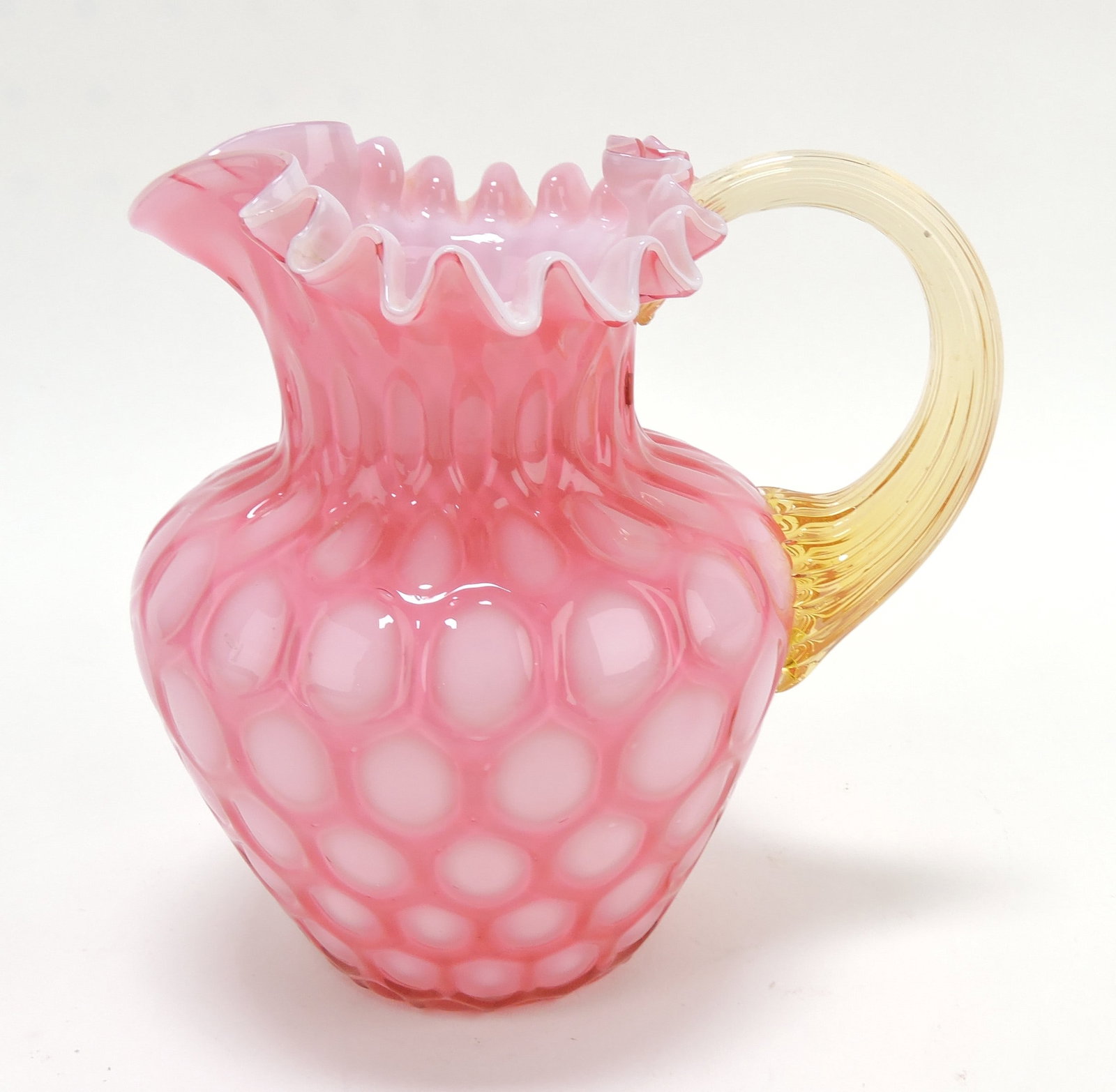 Cranberry cased glass honeycomb: pitcher with amber handle, 5 1/2"