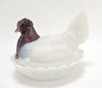 Purple slag glass hen on nest,