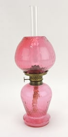 Cranberry miniature oil lamp,