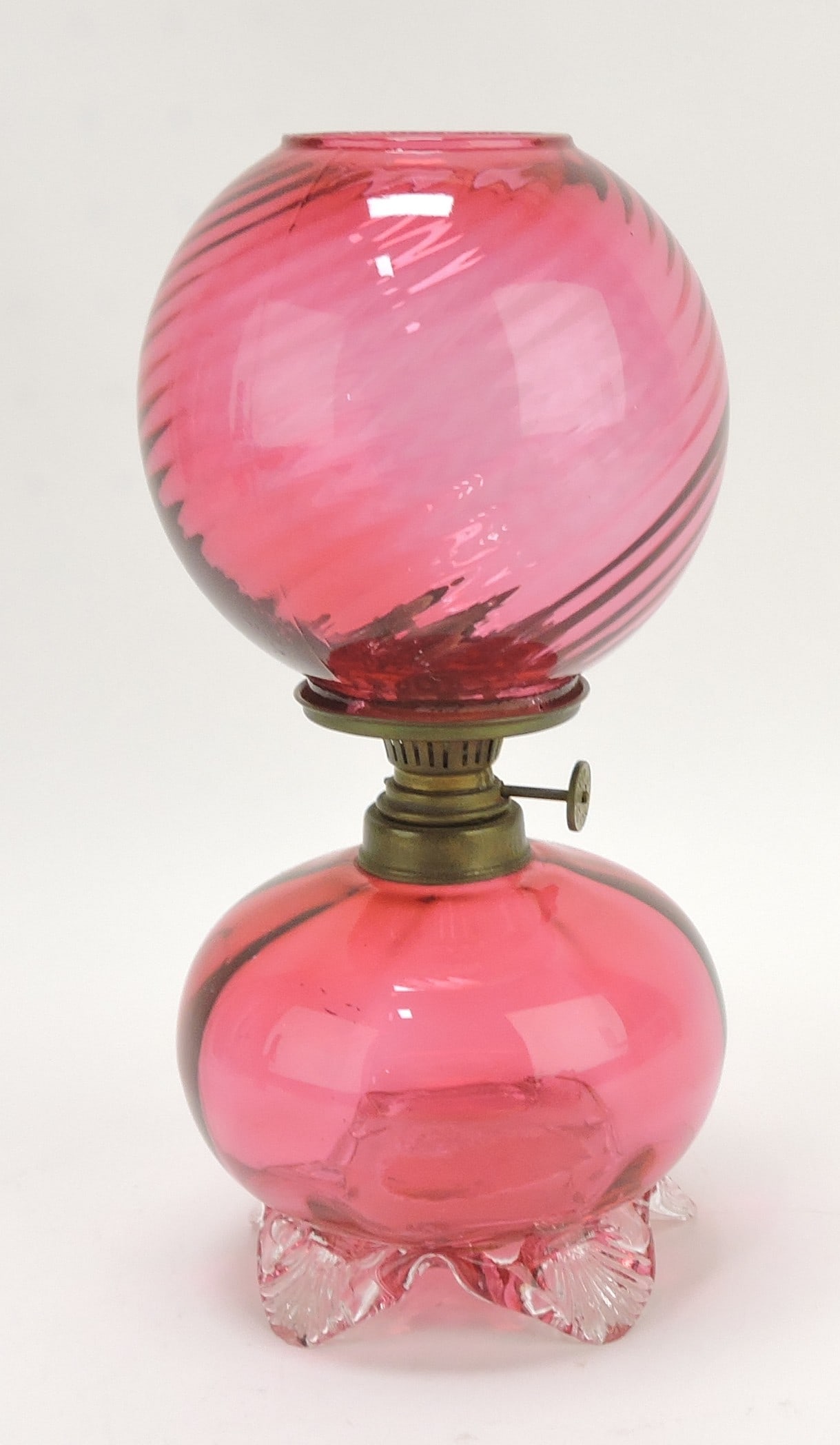 Cranberry miniature oil lamp with: swirl shade (minor fish scale flake to top rim of shade), clear feet