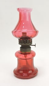 Cranberry miniature oil lamp,