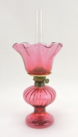 Cranberry miniature oil lamp,