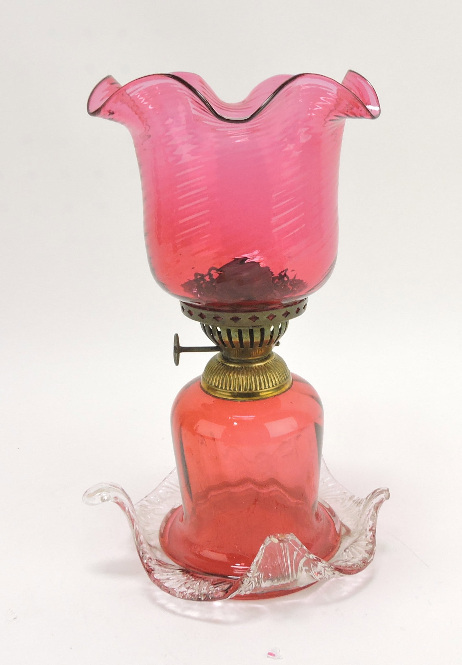 Cranberry miniature oil lamp with: clear base (loss to one tip), 9 1/2"
