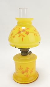 Yellow cased glass enameled