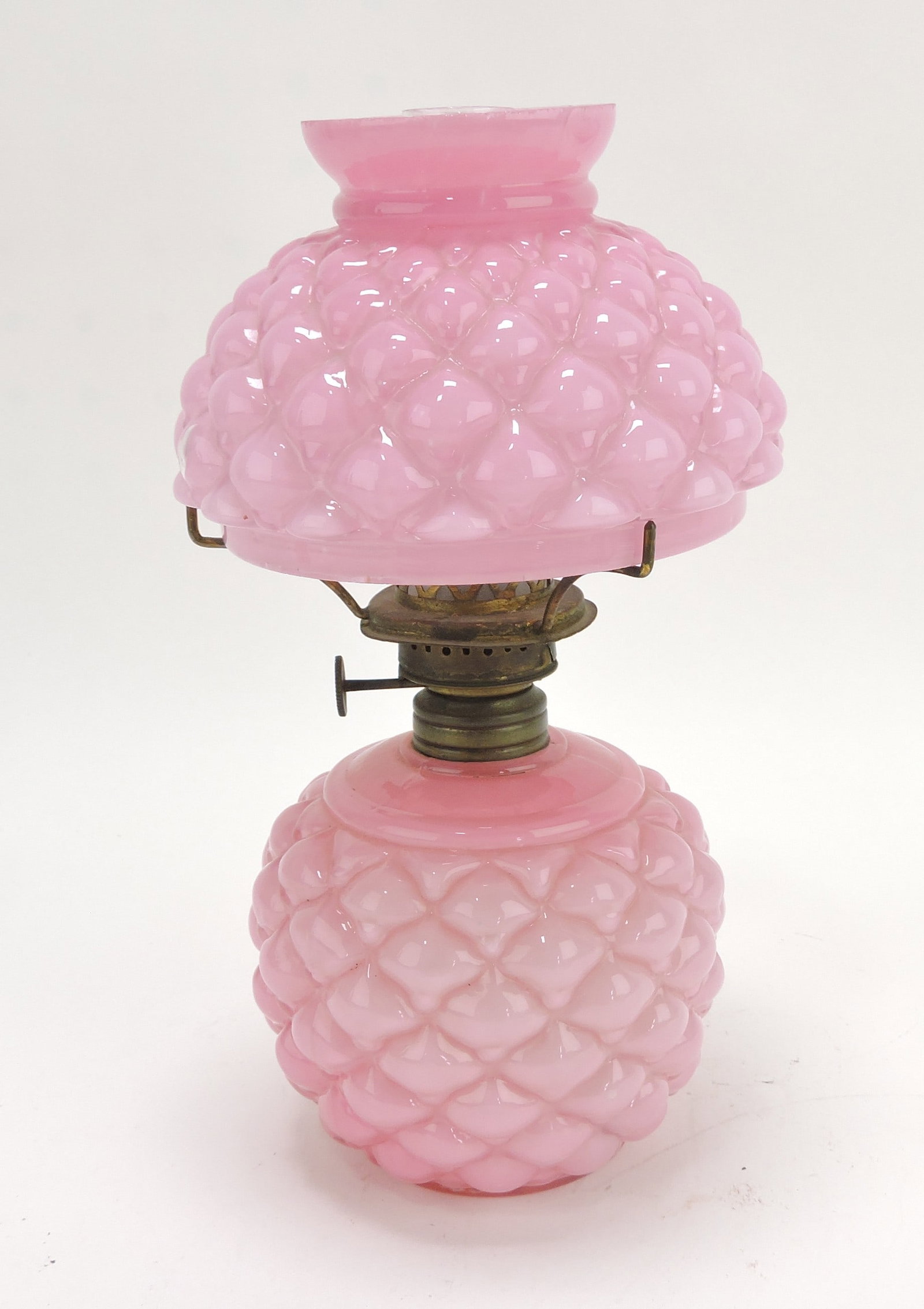 Pink cased glass miniature oil: lamp, 8 1/2"