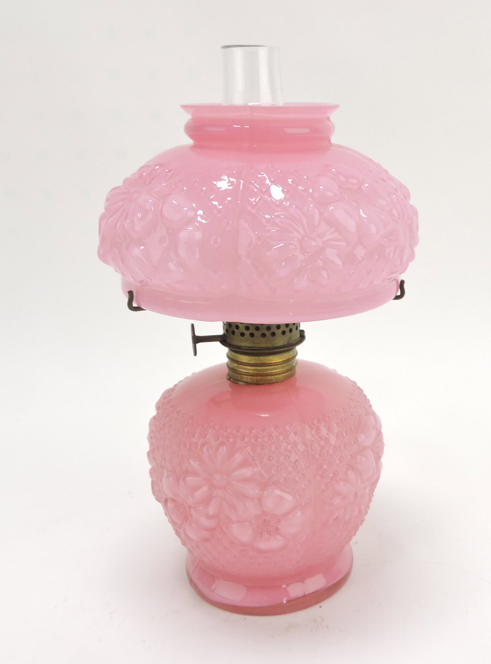 Pink cased glass flower embossed: miniature oil lamp, 7 1/2"